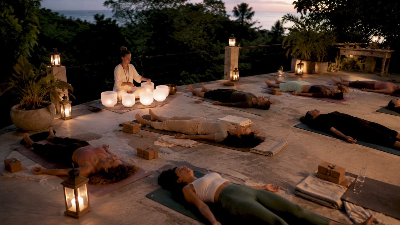 Participants receiving sound bath after yoga